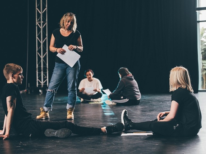 Students rehearsing in a studio 